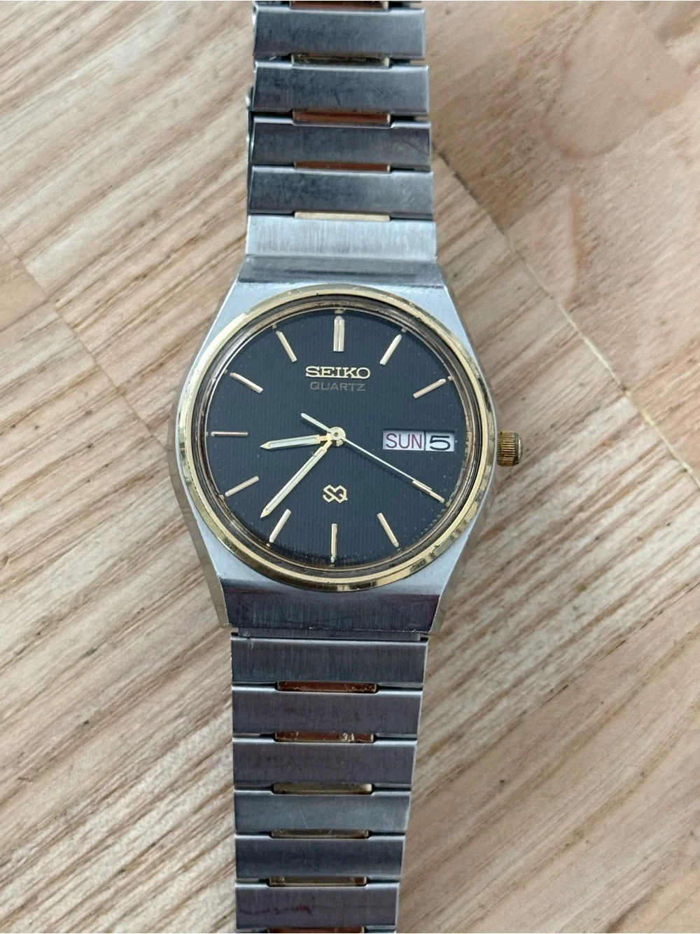 Seiko SQ Vintage Watch Gold Plated Bezel and Bracelet Black Dial Date Window